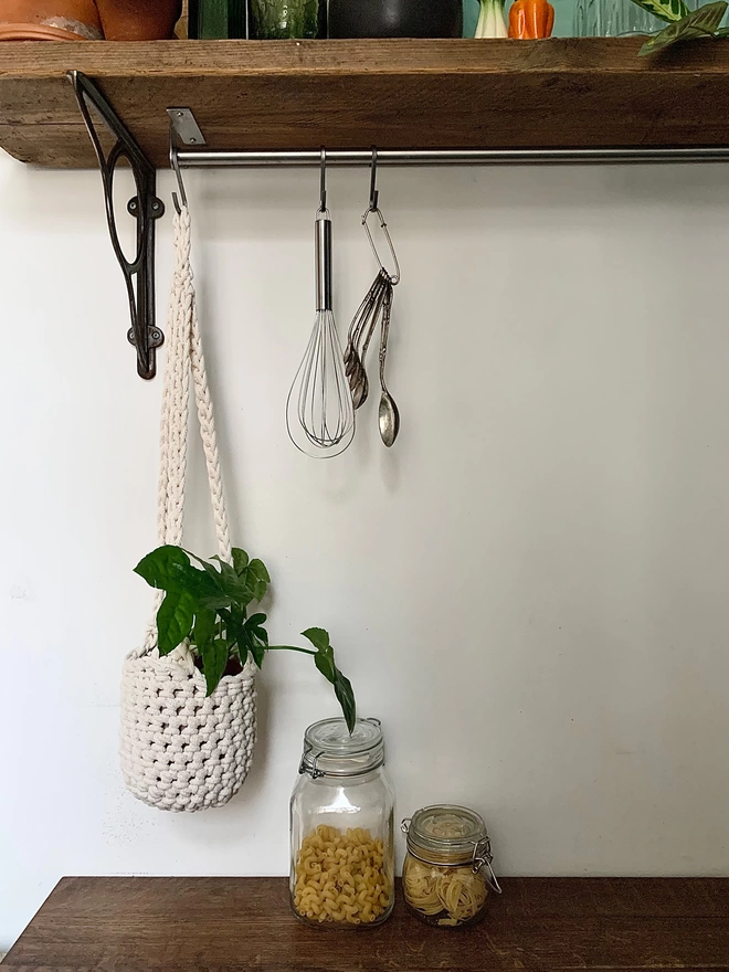 medium indoor cream hanging plant holder, recycled cotton cream three string hanging planter, handmade sustainable crochet decor, rustic natural organic homeware accessories, hanging ceiling plant holder with basket and hook to hang