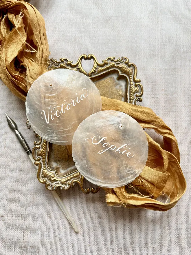 Close up of Capiz shell place cards