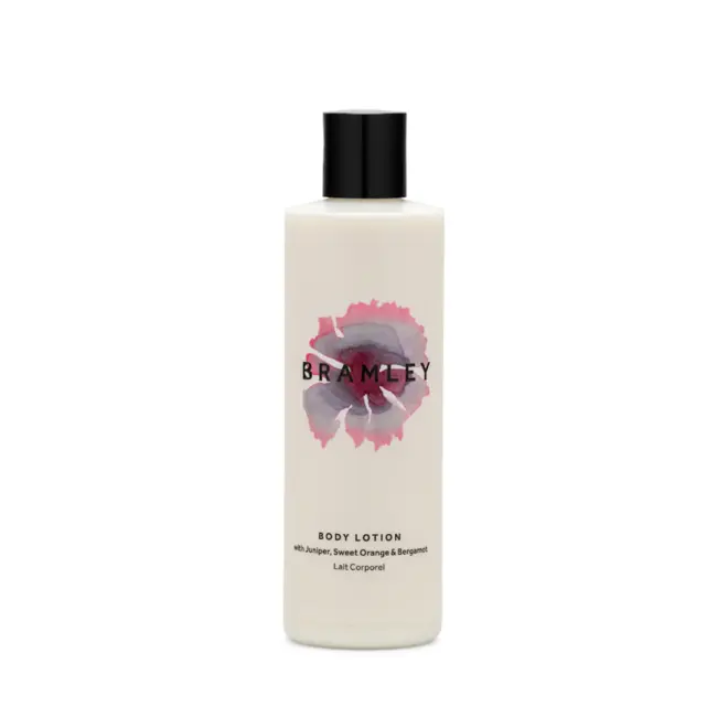 white bottle of body lotion with black lid and pink/purple flower logo that reads "Bramley"