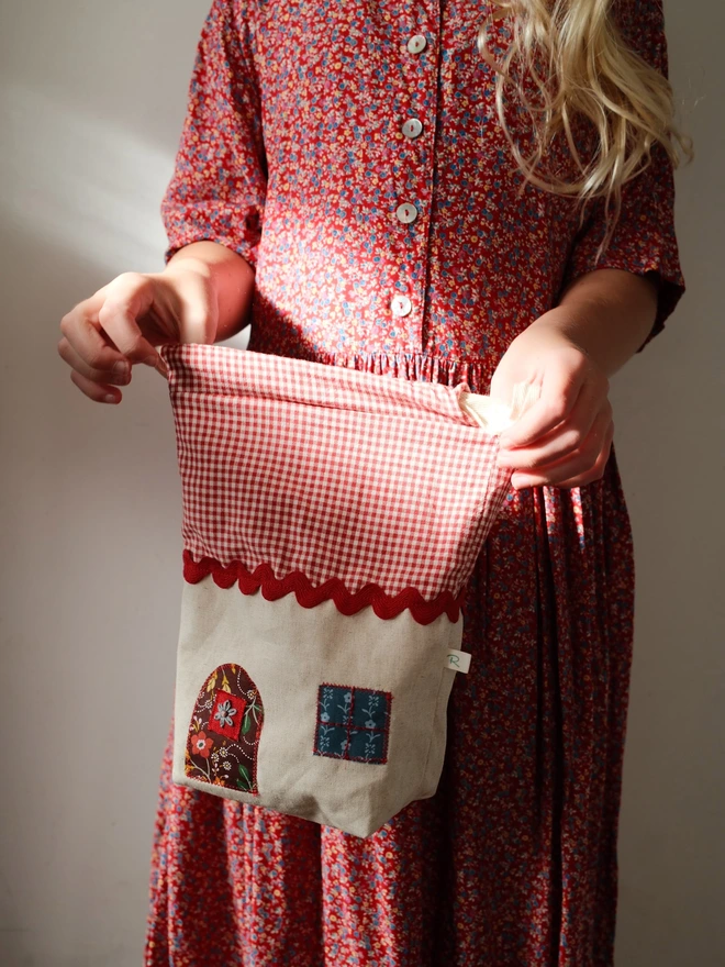 little hands opening the bag