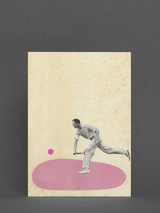 A greeting card depicting a male tennis player hitting a ball. 