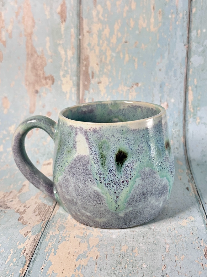 Green and Purple Christmas Snow Globe Mug