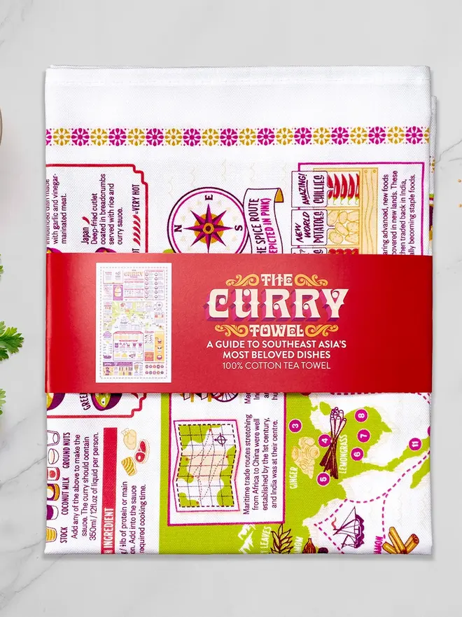 The Curry Towel, against a grey background. 