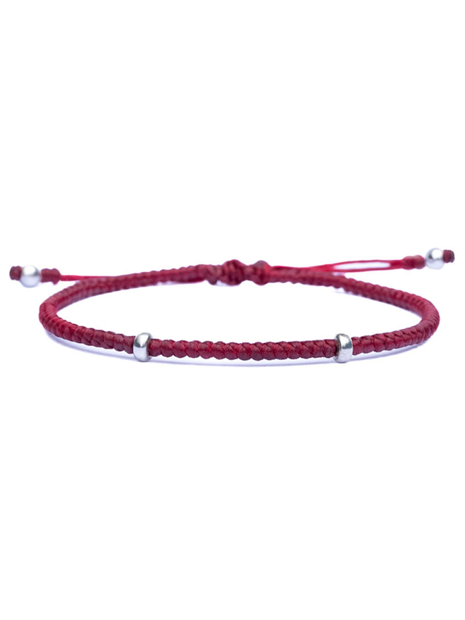 red cord bracelet