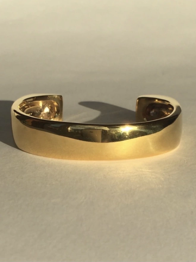 bank view of a wax cast contemporary cuff bangle