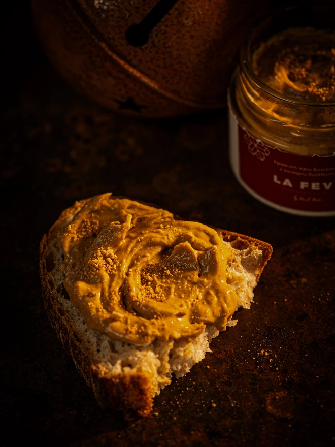 Yellow nutty spread on a bread