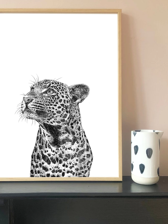 Art print of a hand drawn leopard displayed in a frame