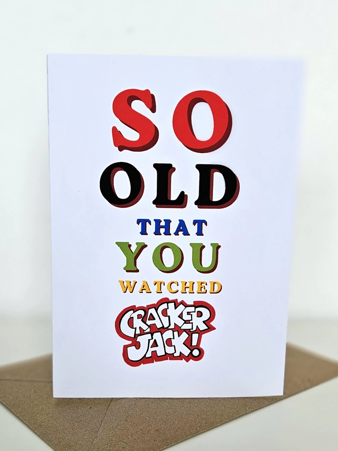 A nostalgic card that says So old that you watched Cracker Jack in colourful retro style fonts on a white background. 