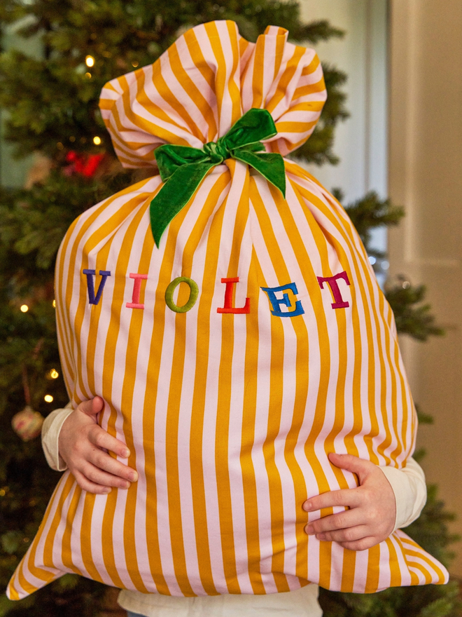 Personalised bright striped Christmas sacks