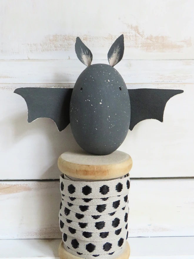 hand painted wooden bat decoration with painted cotton ears and wings