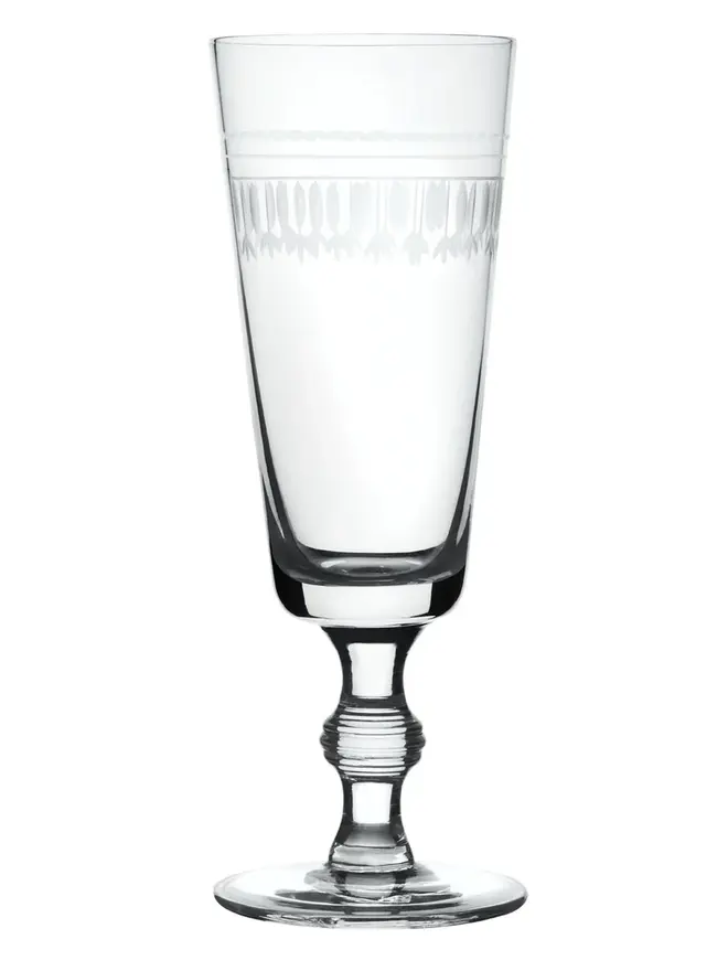 engraved ovals champagne flutes (set of 4). a champagne glass with an oval pattern around the rim.