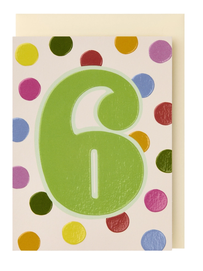 A colourful polka dot card featuring a large green 6 in the centre