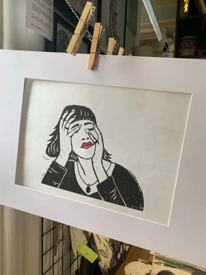 woman linocut print susan bradley on drying rack