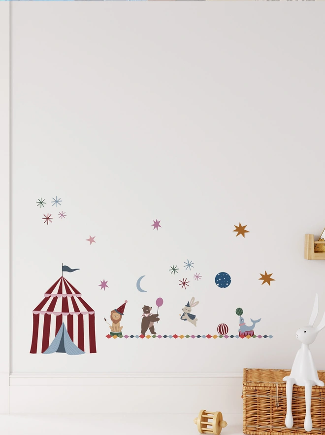 circus wall stickers on a white wall in a nursery