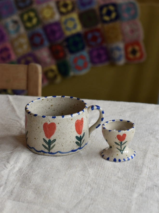 ceramic mug and egg cup