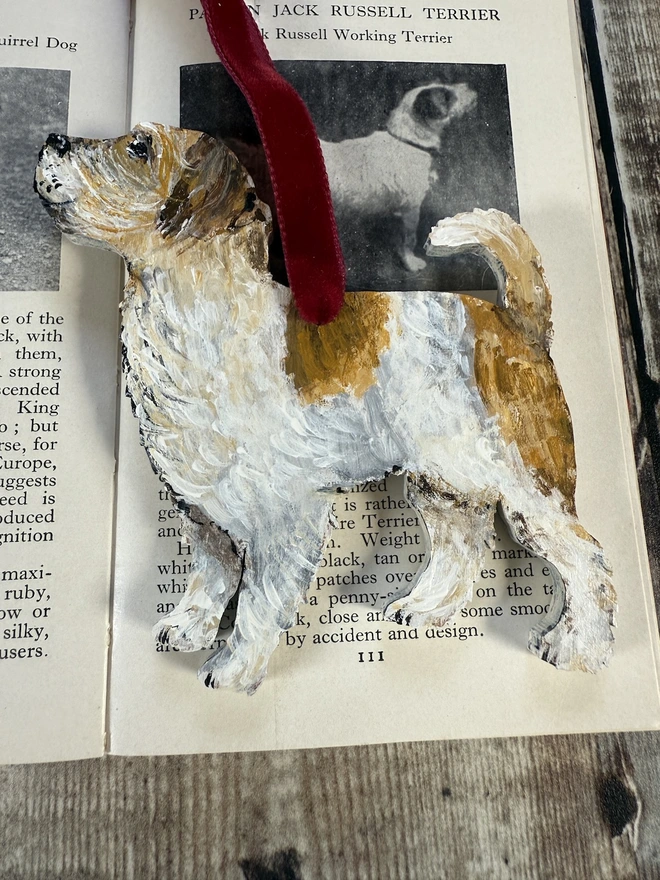 Wire Haired Jack Russell Dog Christmas decoration strung with red velvet ribbon