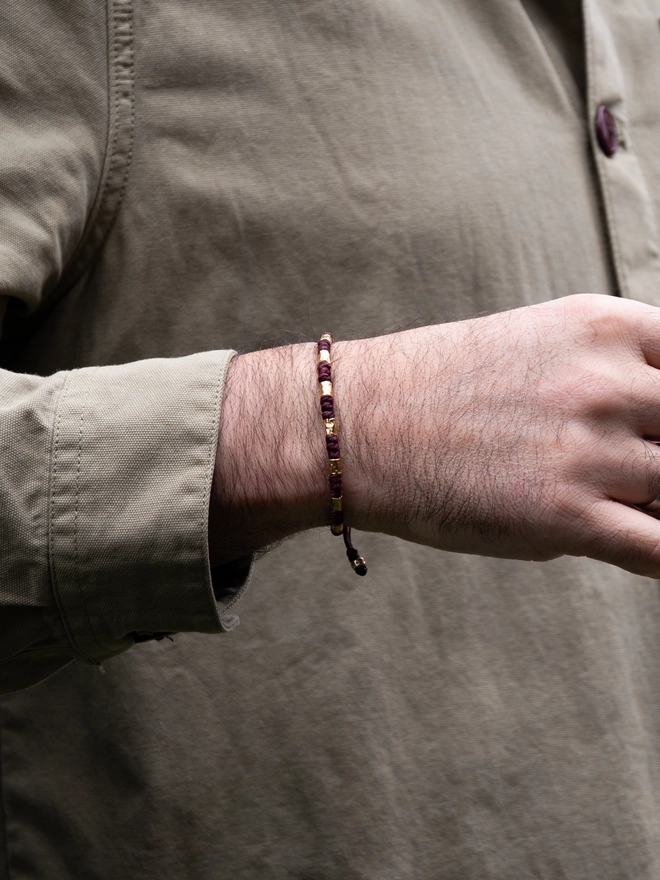 red cord bracelet for man