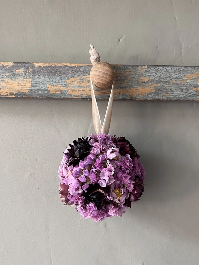 Berry Dried Flower Bauble made using a selection of pink and purple dried flowers