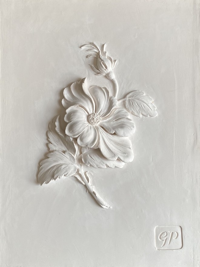 Detail of plaster of Paris bas-relief wall sculpture with Wild Rose flower design 