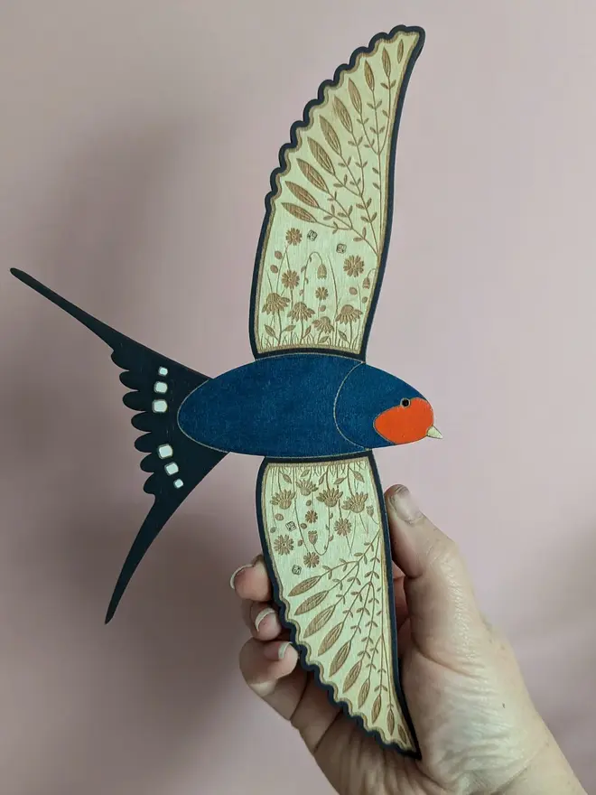 Flying Wooden Barn Swallows Hanging Wall Decor (Set Of 3), wooden barn swallow flying hung on a wall. 