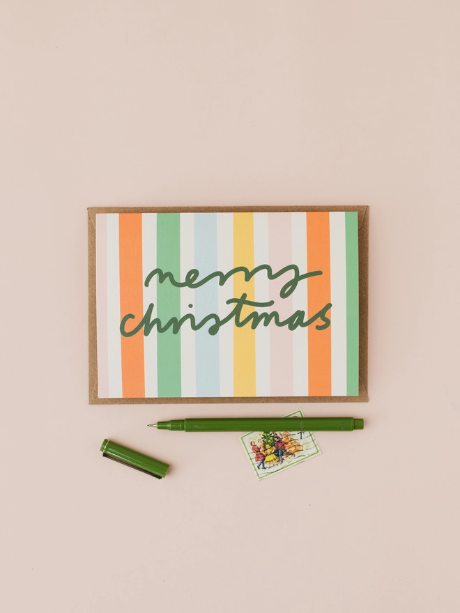 Merry Christmas words on a colourful background