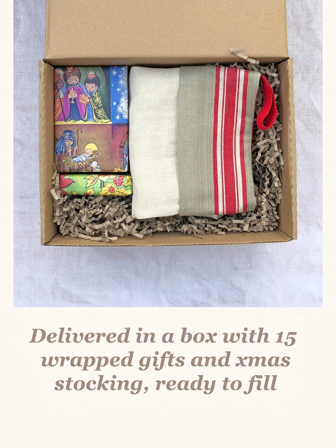 box of wrapped gifts and christmas stocking