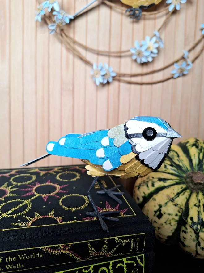 Handmade bird sculpture, depicting a blue tit