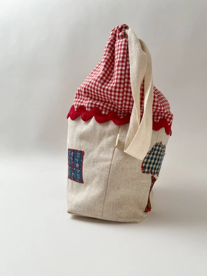 side view of red roof bag