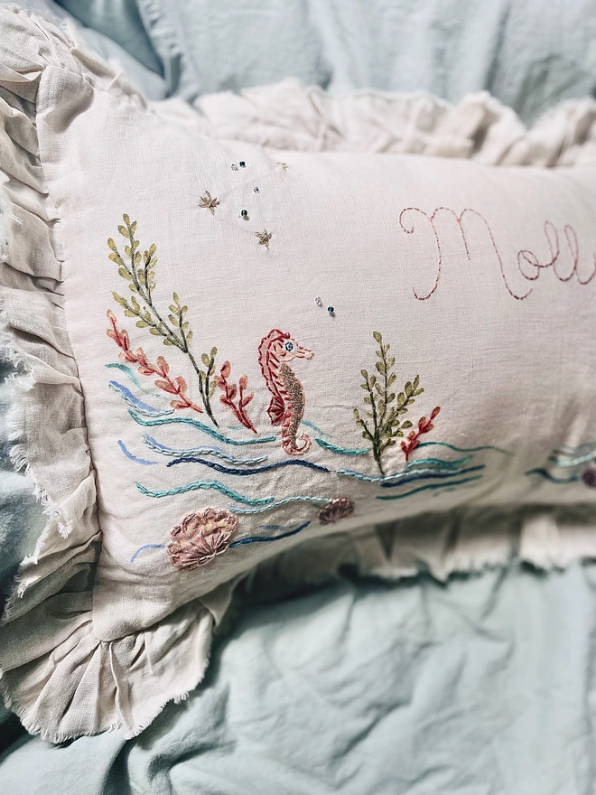 Under the sea, hand embroidered cushion on natural linen with personalised name 