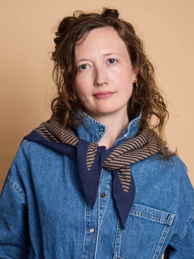 woman wearing navy stripe wool neckerchief