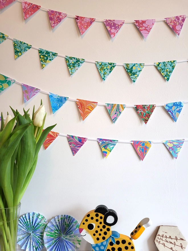 Hand-marbled multi-coloured rainbow paper bunting