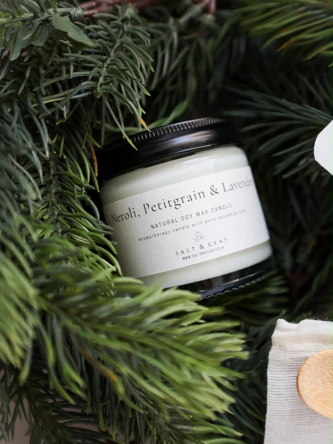 A hand poured soy wax candle with essential oils.