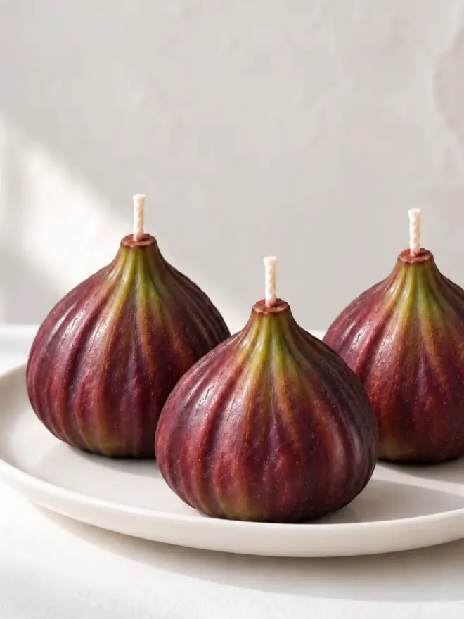  trio of fig candles on a plate