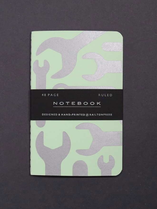 Lined Spanner Pocket Notebook. A notebook in pastel green