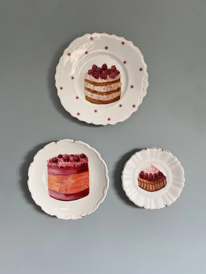 painted cake plates display