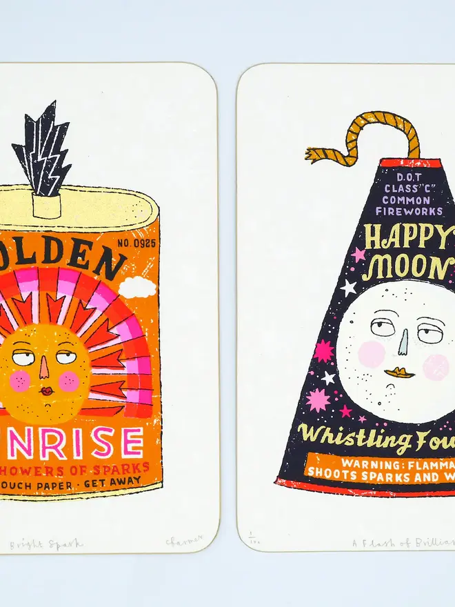 Sun And Moon Firework Screenprint Duo, a pair of colourful firework designs in the centre of white card. 
