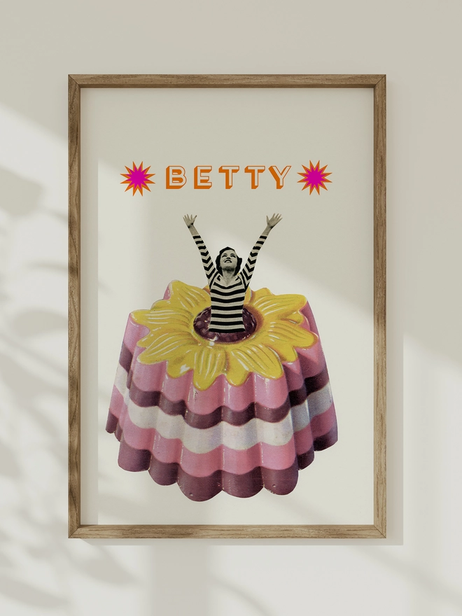 A retro personalised food print featuring a woman jumping out of a giant blancmange.