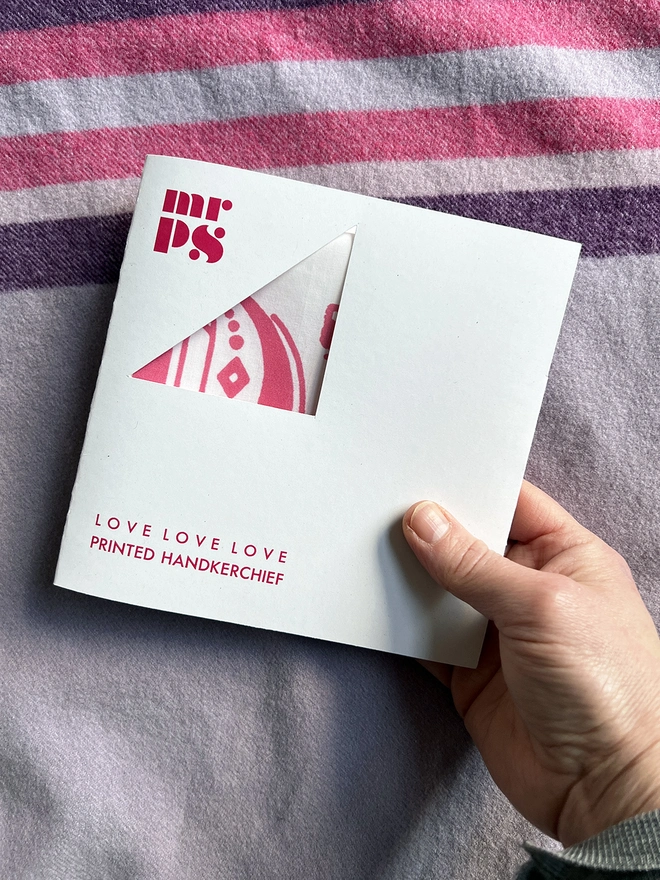  The front of the card wallet package that contains a Mr.PS Love Love Love Handkerchief