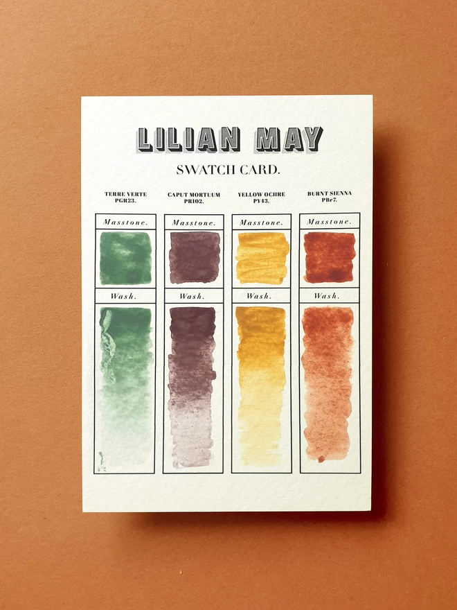 A swatch card with the colours from the earth pigment paint set.
