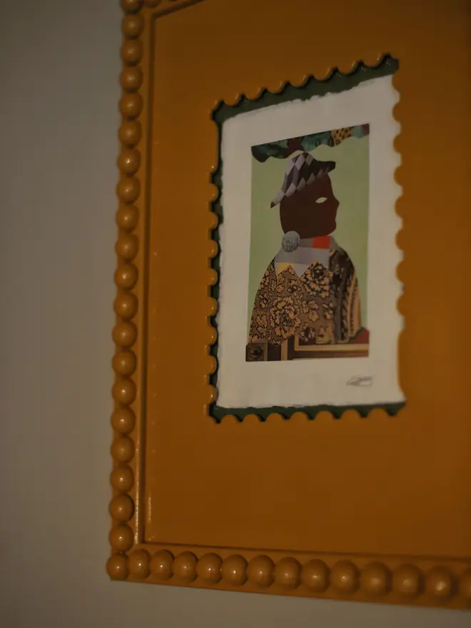 mustard stamp shaped frame mount with frame and picture