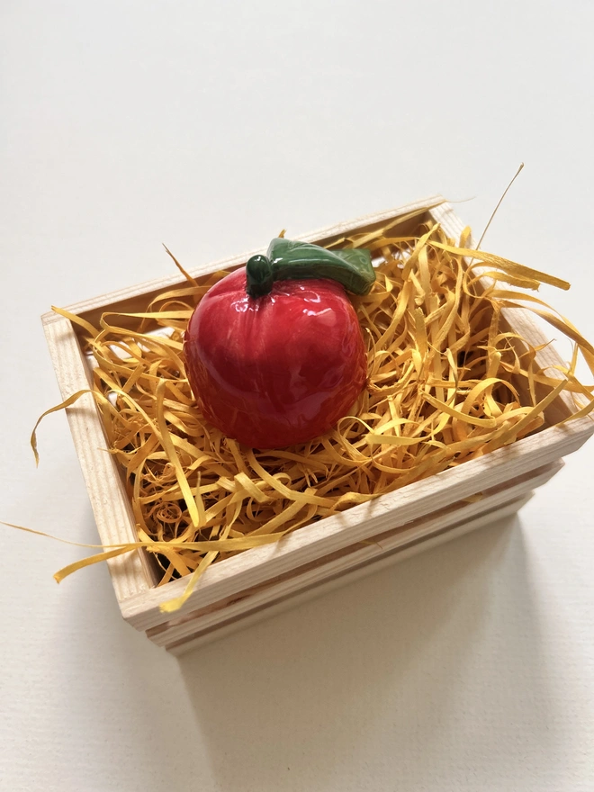 bright red apple candle snuffer