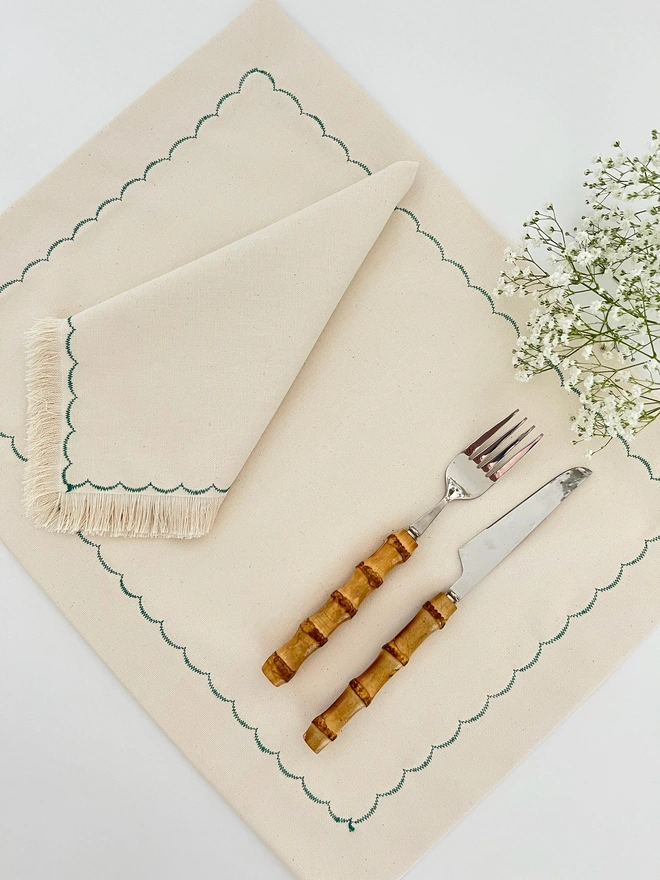 green scalloped placemat