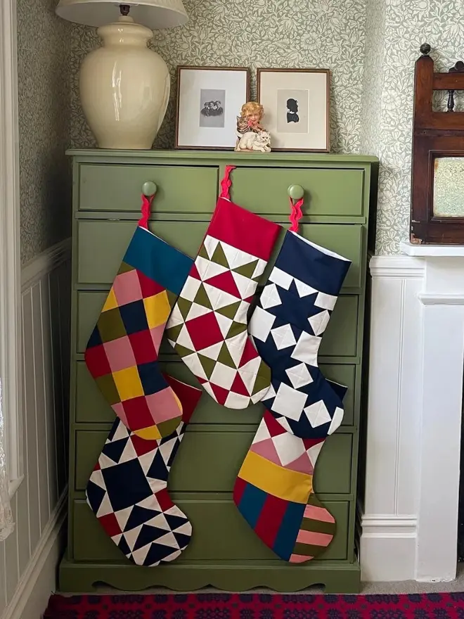 Harlequin Patchwork Stocking, hanging. 