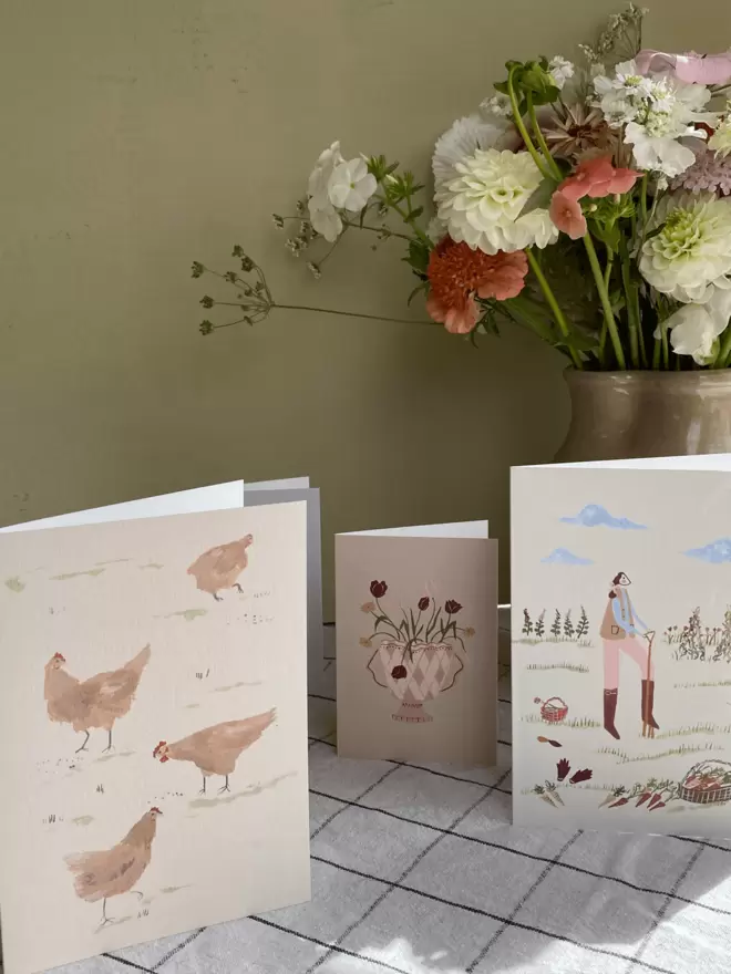 greetings cards with chickens, flowers and gardening on. 