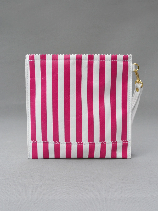 replica of a pink striped paper bag made in leather as a purse by Natthakur