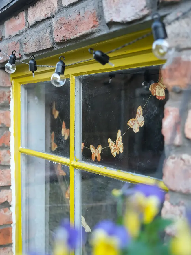 yellow british butterflies paper garland decoration