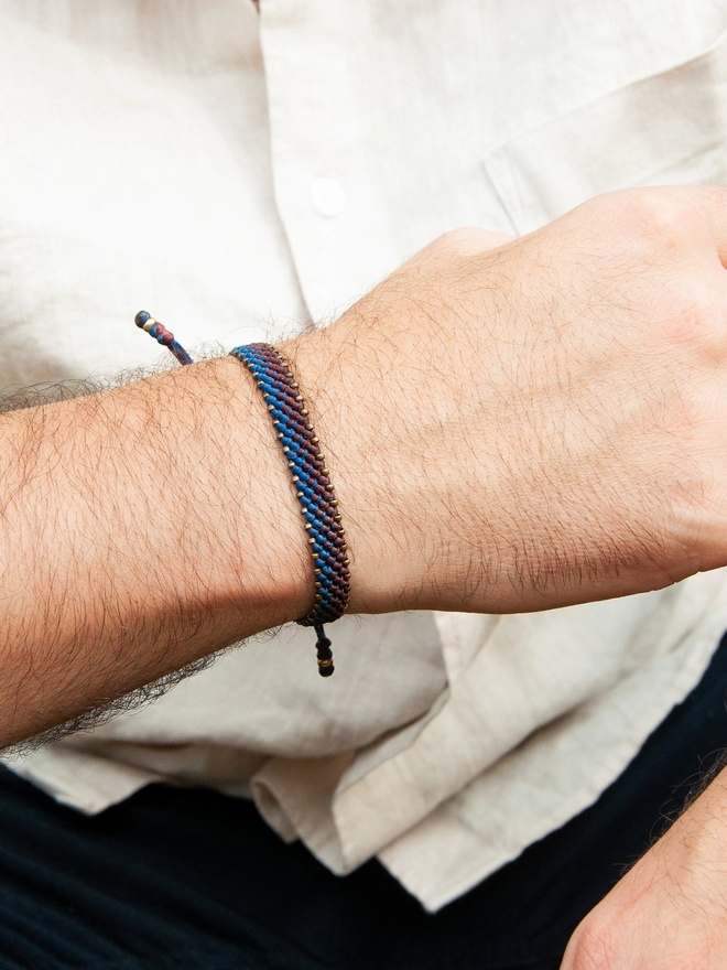 men wearing a bronze rope bracelet