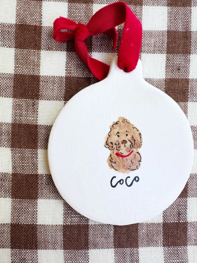 Flat Bauble. A personalised and illustrated flat bauble.