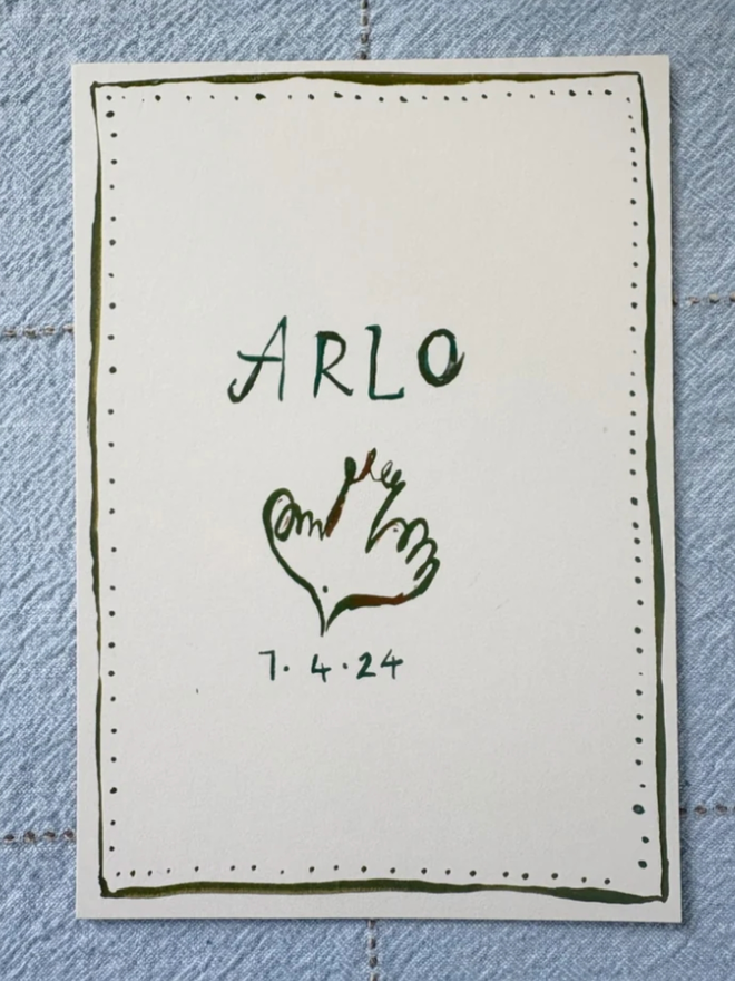 Keepsake Name Watercolour. A watercolour piece illustrated in leaf green with a name and a bird.