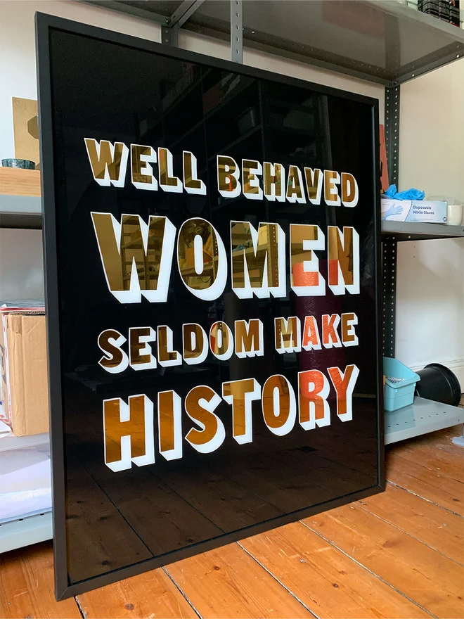 well behaved women seldom make history gold sign